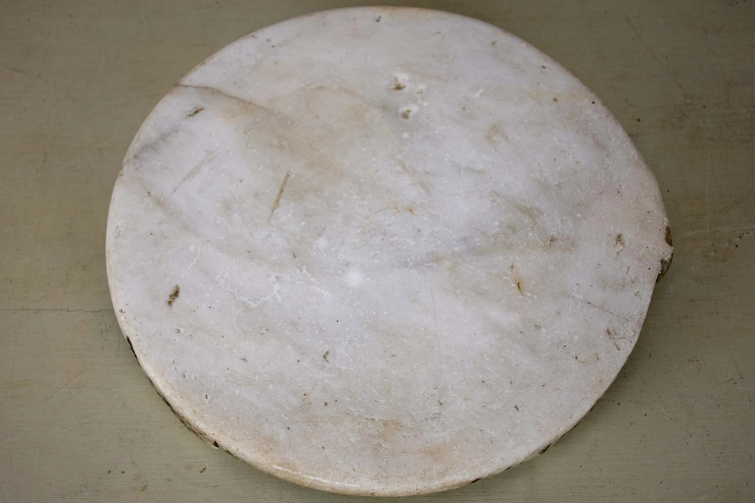 Antique marble footed trivet