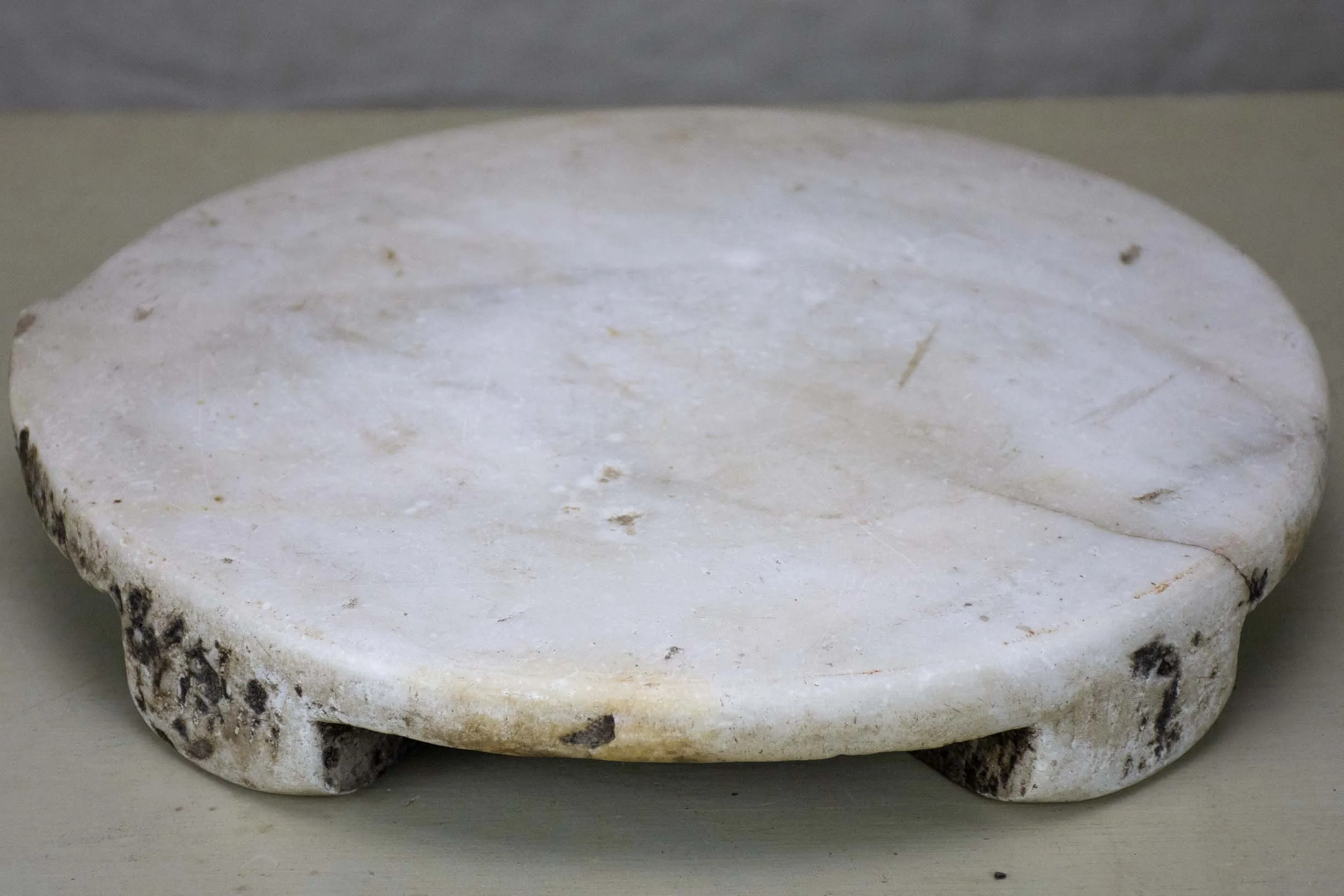 Antique marble footed trivet