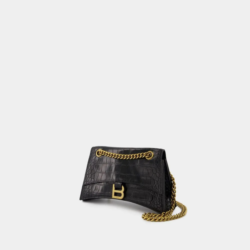 BALENCIAGA CRUSH CHAIN SMALL BAG IN CROCODILE-EMBOSSED LEATHER.  DIMENSIONS: L24.9 X H14 X W7.9 CM.  49.8 CM LONG CHAIN SHOULDER STRAP.  CURVILINEAR BOTTOM.  AGED GOLD FINISH.  STUDDED MAGNET