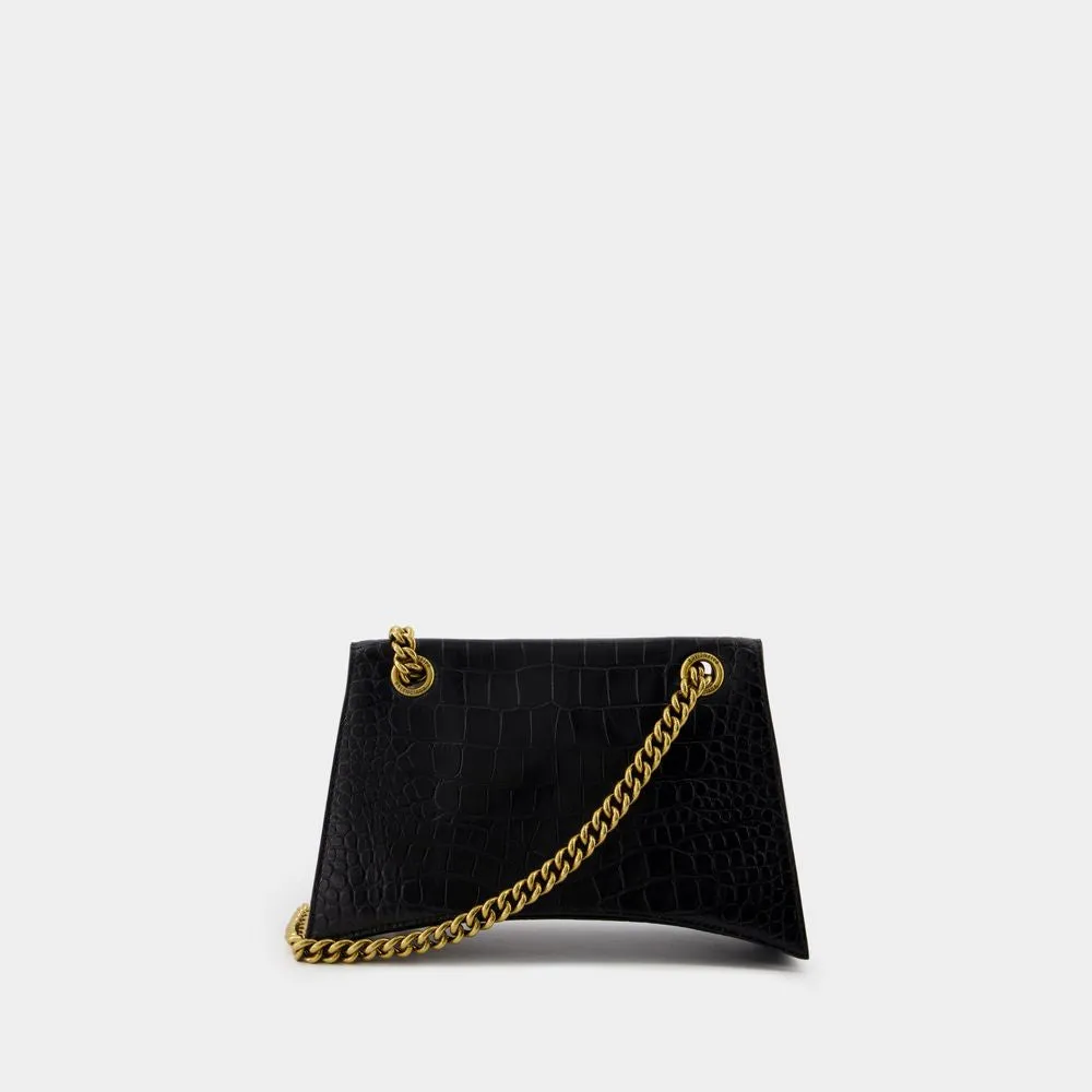 BALENCIAGA CRUSH CHAIN SMALL BAG IN CROCODILE-EMBOSSED LEATHER.  DIMENSIONS: L24.9 X H14 X W7.9 CM.  49.8 CM LONG CHAIN SHOULDER STRAP.  CURVILINEAR BOTTOM.  AGED GOLD FINISH.  STUDDED MAGNET