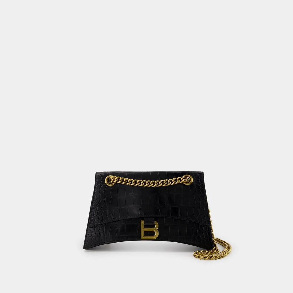 BALENCIAGA CRUSH CHAIN SMALL BAG IN CROCODILE-EMBOSSED LEATHER.  DIMENSIONS: L24.9 X H14 X W7.9 CM.  49.8 CM LONG CHAIN SHOULDER STRAP.  CURVILINEAR BOTTOM.  AGED GOLD FINISH.  STUDDED MAGNET