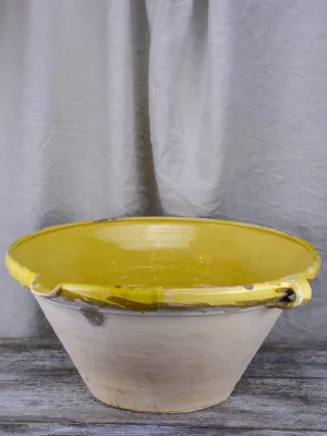 Large antique French 'tian' bowl with yellow glaze