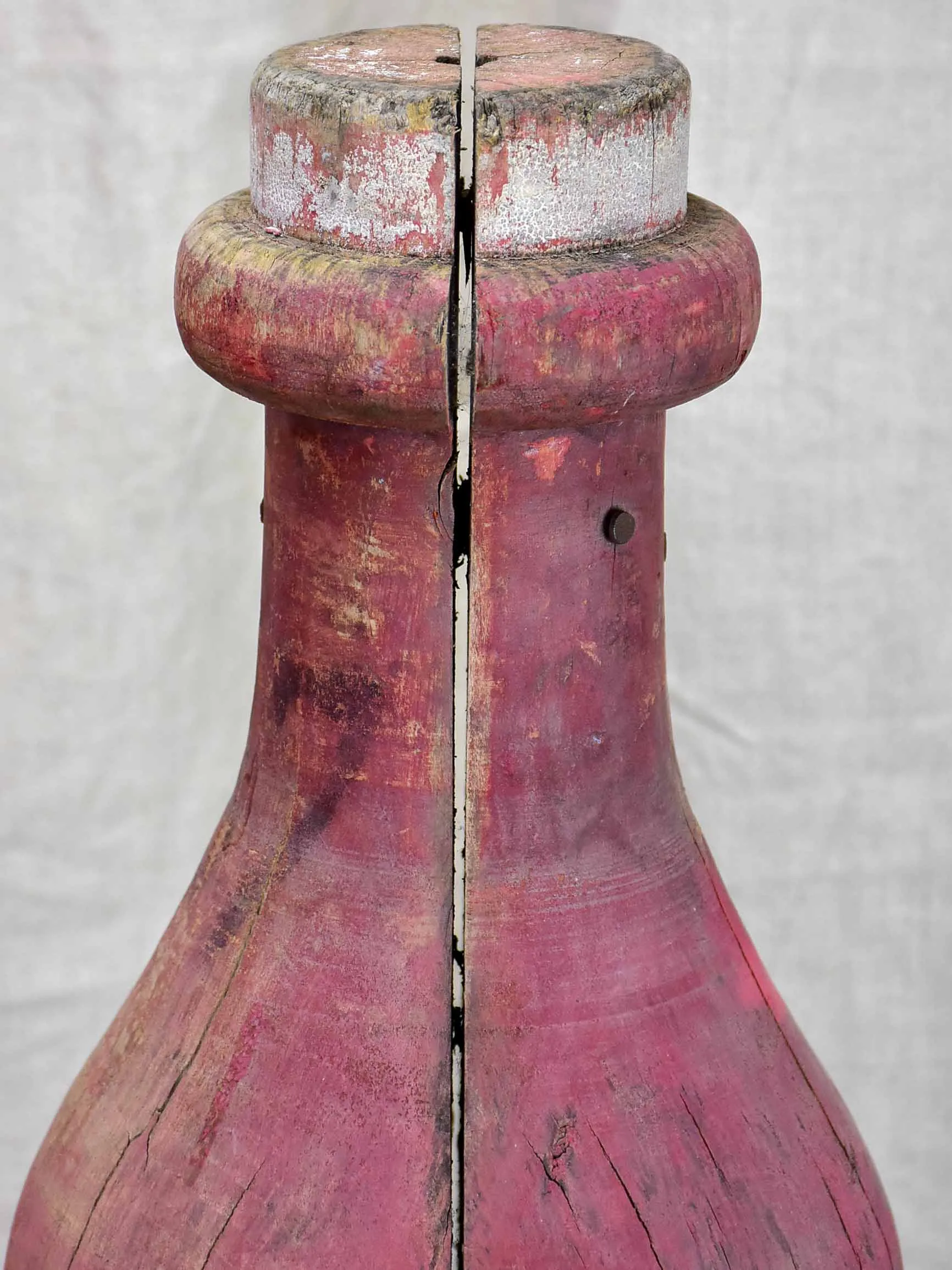 Oversize wooden Morgan bottle sculpture from Beaujolais