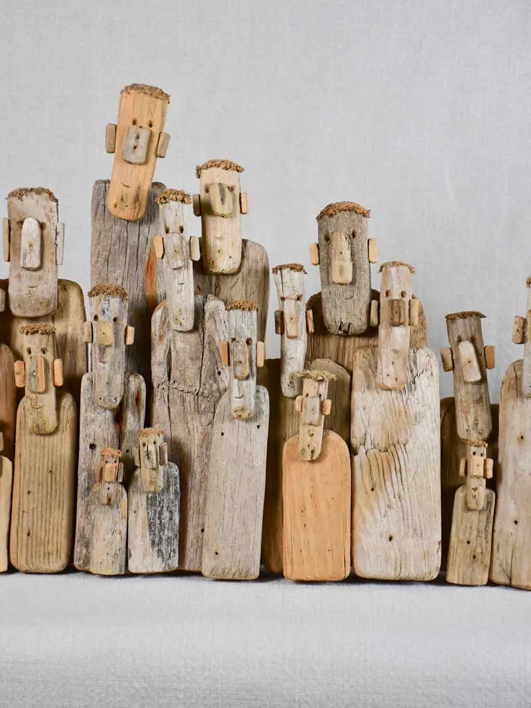 Panoramic driftwood sculpture by JP Dreano - 34 characters 27½"