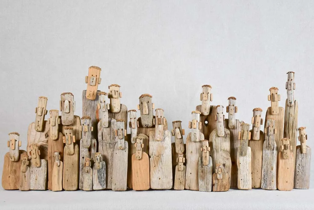 Panoramic driftwood sculpture by JP Dreano - 34 characters 27½"