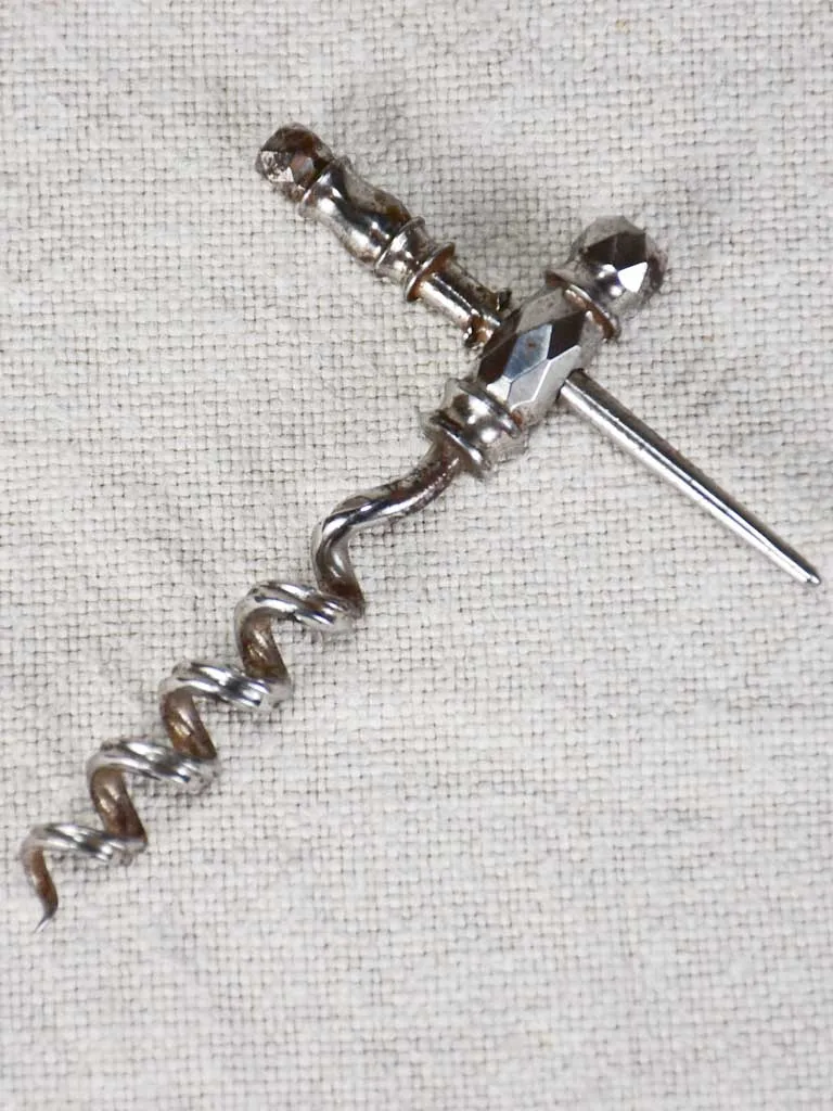 Superb early 20th century travel bottle opener