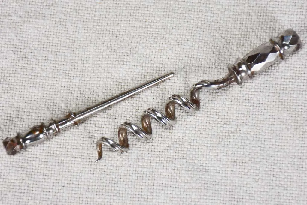 Superb early 20th century travel bottle opener
