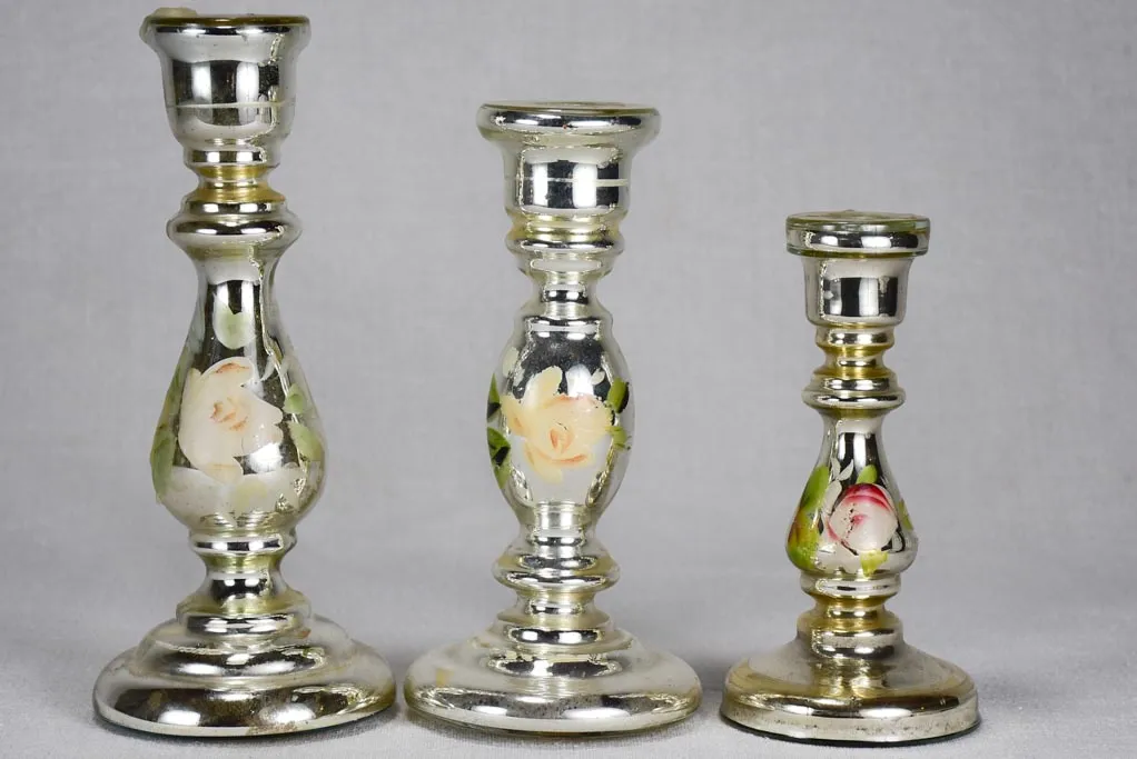 Three mercury glass candlesticks with hand-painted flowers